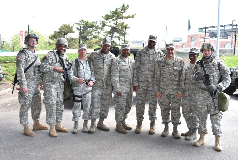 The 175th Wing the religious support team met with Soldiers and Airman at a staging area in Baltimore May 2. Soldiers and Airmen were there support Operation Baltimore Rally during the state of emergency in Baltimore. (U.S. Air National Guard photo by  Senior Master Sgt. Ed Bard/RELEASED) 
