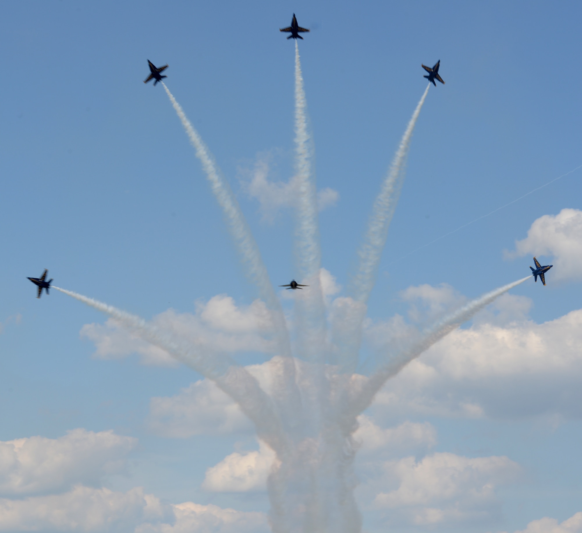 The U.S. Navy Flight Demonstration Team Blue Angels F/A-18 Hornets perform an aerial maneuver for the Defenders of Liberty Air Show on Barksdale Air Force Base, Louisiana, May 2, 2015. The mission of the Blue Angels is to showcase the pride and professionalism of the United States Navy and Marine Corps by inspiring a culture of excellence and service to country through flight demonstrations and community outreach. (U.S. Air Force photo/Airman 1st Class Curt Beach)