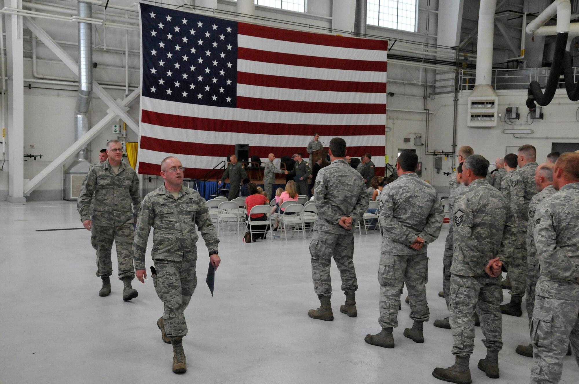 Col. Lawrence Christensen, Commander of the Iowa Air Nation Guard’s 185th Air Refueling Wing, representatives for Iowa Sens. Chuck Grassley and Joni Ernst, Sioux City Mayor Bob Scott, and various state and local officials welcomed home members of the unit, in Sioux City, IA., on May 2, 2015. The 138 Airmen had deployed overseas during the past year in support of federal missions. (U.S. Air National Guard Photo by Tech. Sgt. Oscar Sanchez 185th ARW Public Affairs/Released)