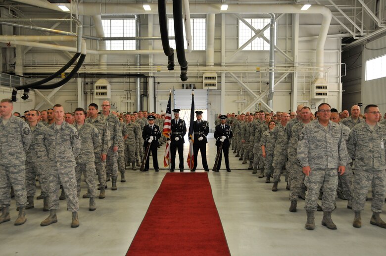 Honor guard members stand-by to start a welcome home ceremony for 138 Airmen who deployed over the last year to locations overseas. The families of the members who deployed and community leaders attended the ceremony held at the 185th Air Refueling Wing (ARW), in Sioux City, IA., on May 3, 2015. (U.S. Air National Guard Photo by: Tech. Sgt. Oscar Sanchez 185th ARW Wing Public Affairs/Released)