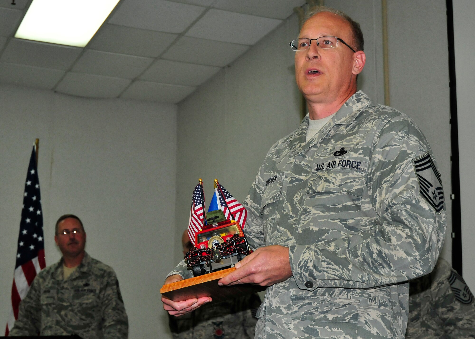 Chief Master Sgt. David Parcher, 919th Special Operations Maintenance Squadron, became Duke Field’s newest Jeep Chief during his induction ceremony May 2.   The “Jeep Chief” must keep the jeep trophy with them at all times while on duty or “pay” the consequences from the chief’s group.  (U.S. Air Force photo/Dan Neely)