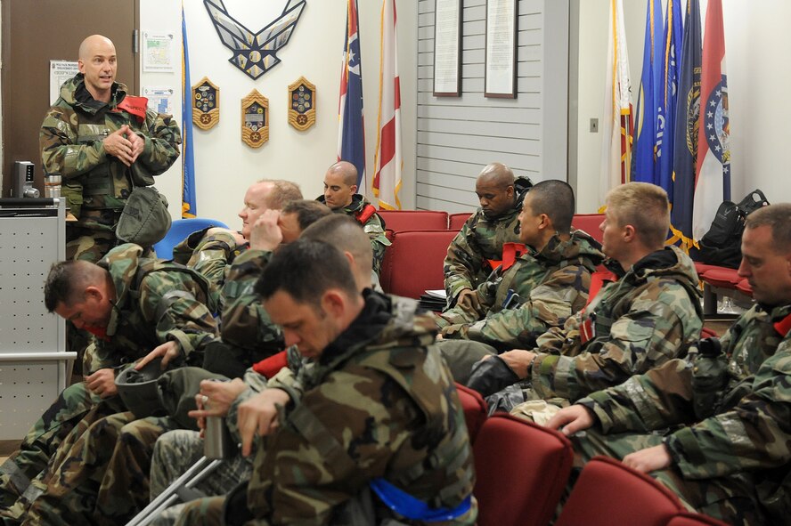 Lt. Col. Christopher Heber, 8th Fighter Wing inspector general, briefs the wing inspection team during Exercise Beverly Midnight 15-3, April 29, 2015, at Kunsan Air Base, Republic of Korea. During the six-day exercise, WIT members evaluated Wolf Pack Airmen in a controlled environment to inspect their ability to adapt and perform in wartime scenarios. (U.S. Air Force photo by Senior Airman Divine Cox/Released)