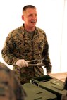 Brig. General Tracy W. King serves lunch with other senior leadership to Marines after the final U.S. Marine Corps training event of exercise Balikatan in Crow Valley, April 27. The last U.S. Marine Corps event of Balikatan involved cross-training and interoperability field-training exercises. This was the 31st iteration of Balikatan, the annual interoperability exercise with the U.S. military and the Armed Forces of the Philippines. King, from Oklahoma, City, is the Commanding General for 3rd Marine Logistic Group, III Marine Expeditionary Force. (U.S. Marine Corps photo by Lance Cpl. Mandaline Hatch/Released)