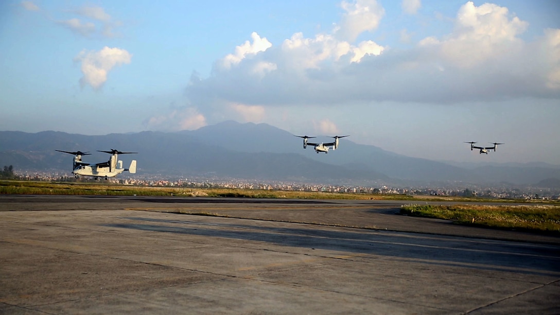 U.S. Marine V-22 Ospreys fly into Tribhuvan International Airport in Kathmandu, Nepal, May 3. U.S. Marines also brought an UH-1N Huey, tools and equipment to support the government of Nepal. The Nepalese Government requested the U.S. Government’s help after a 7.8 magnitude earthquake struck their country, April 25. The aircraft are with Marine Medium Tiltrotor Squadron 262, Marine Aircraft Group 36, 1st Marine Aircraft Wing, III Marine Expeditionary Force. (U.S. Marine Corps photo by Lance Cpl. Mandaline Hatch/Released)