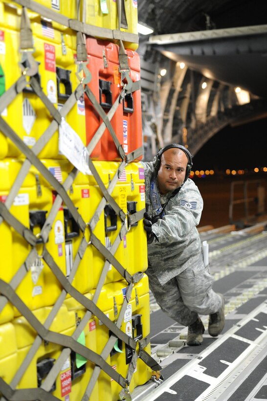 Staff Sgt. Ernie Jimenez, 452nd Aerial Port Support Flight, air transportation craftsman, helps load a pallet of equipment aboard a C-17 Globemaster III aircraft at March Air Reserve Base, Calif., April 26, 2015. The cargo includes sonar detection devices, heavy concrete cutting equipment, generators and more that will be used by an elite 57-person team, known as the Urban Search and Rescue Task Force 2 (CA-TF2), in support of earthquake emergency rescue operations in Nepal.

(U.S. Air Force photo/Senior Airman Russell S. McMillan)
