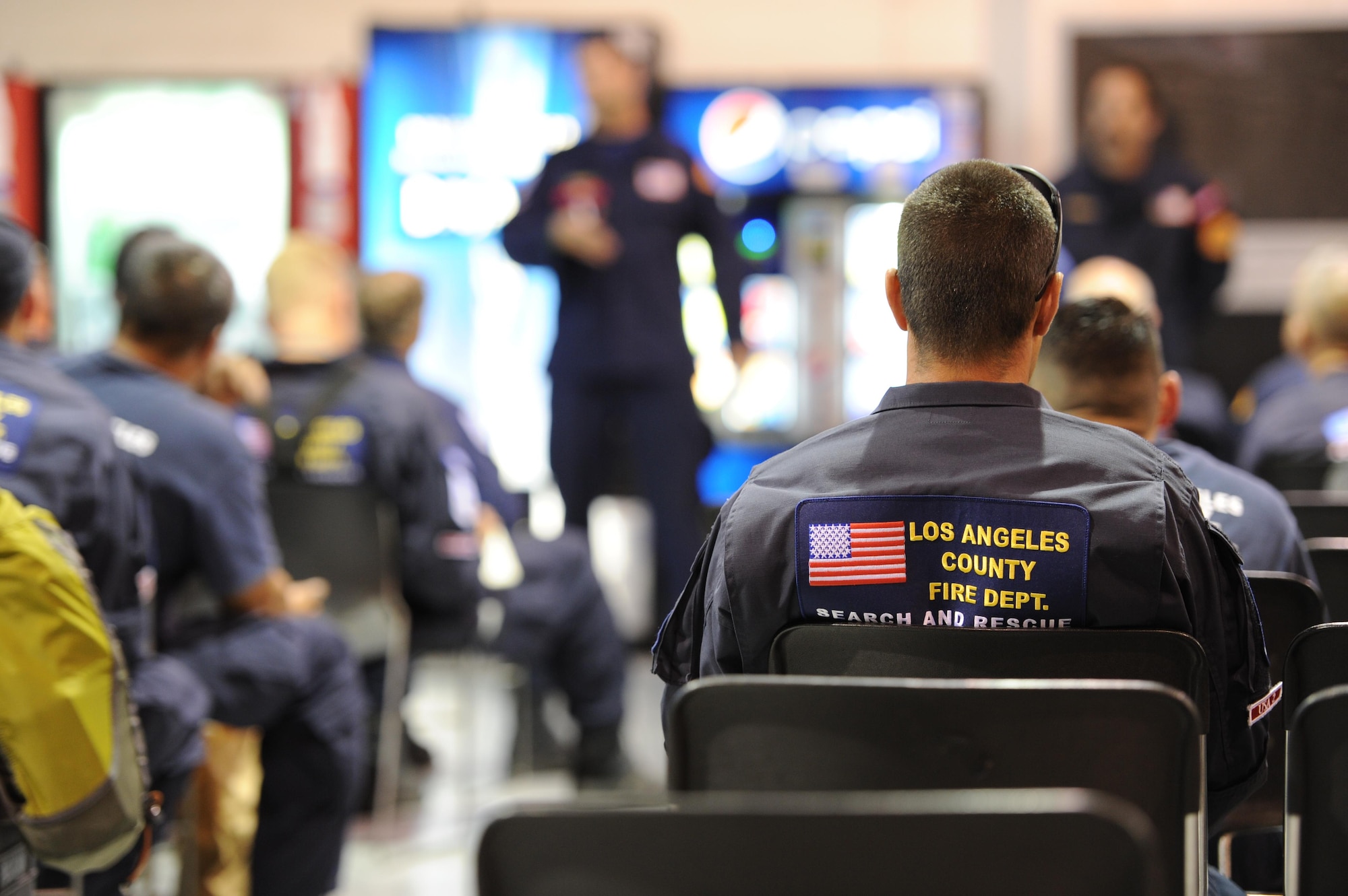 Members from Urban Search and Rescue Task Force 2 (CA-TF2), sponsored by the Los Angeles County Fire Department, Calif., attend a briefing regarding local customs the team should be aware of once reaching Nepal at the deployment hangar at March Air Reserve Base, Calif., April 26, 2015. The 57-person team was activated by the U.S. Agency for International Development’s Office of U.S. Foreign Disaster Assistance in support of earthquake emergency rescue operations in Nepal.

(U.S. Air Force photo/Senior Airman Russell S. McMillan)
