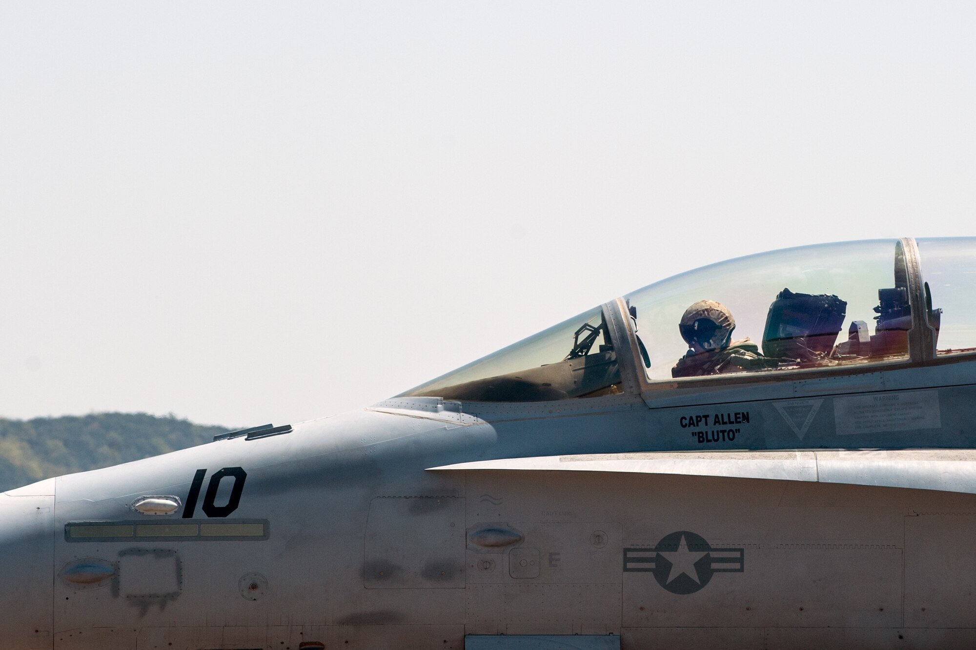 Marine Corps Capt. Jarrod Allen, a Marine Fighter Attack Squadron 225 F/A-18 Hornet pilot, taxis his jet to the runway during exercise Max Thunder 15-1 at Gwangju Air Base, South Korea, April 17, 2015. Jarrod was reunited with his brother, Air Force Capt. Jacob Allen, a 35th Fighter Squadron F-16 Fighting Falcon pilot, during the exercise. Max Thunder is a large-scale employment exercise designed to increase interoperability between U.S. and South Korea forces, and ultimately enhance commitments to maintain peace in the region. (U.S. Air Force photo/Senior Airman Taylor Curry) 