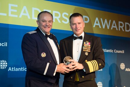 Vice Chairman of the Joint Chiefs of Staff Adm. James A. Winnefeld, Jr. presents U.S. European Commander Gen. Philip Breedlove with the  Distinguished Military Leadership Award during the 2015 Atlantic Council Distinguished Leadership Awards dinner, in Washington, D.C., April 30, 2015.