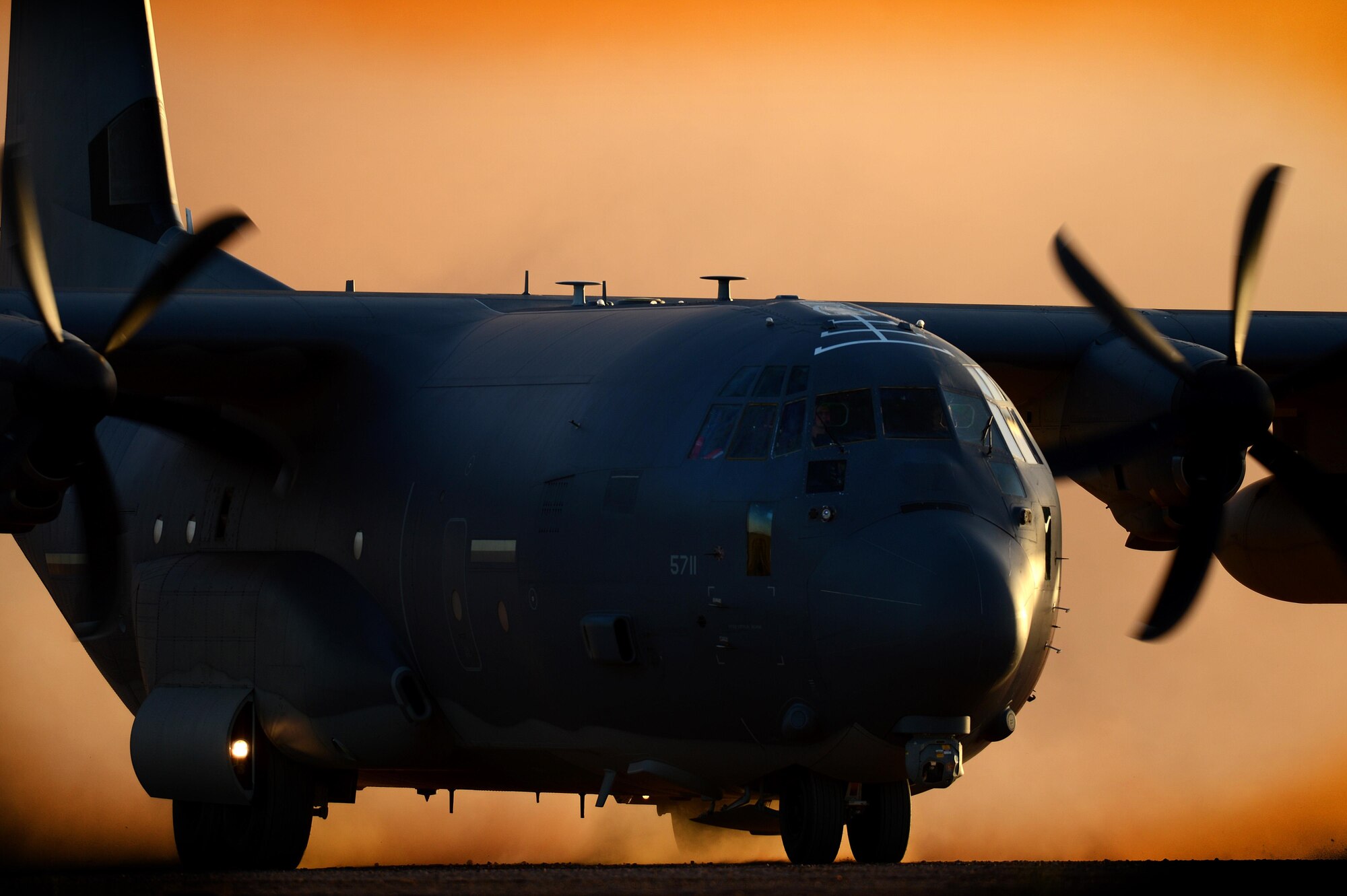 An MC-130J Commando II aircraft from the 9th Special Operations Squadron taxis for departure from Red Horse landing zone in support of Emerald Warrior April 29, 2015, at Melrose Air Force Range N.M. Emerald Warrior is the Department of Defense's only irregular warfare exercise, allowing joint and combined partners to train together and prepare for real world contingency operations. (U.S. Air Force photo/Staff Sgt. Matthew Plew)