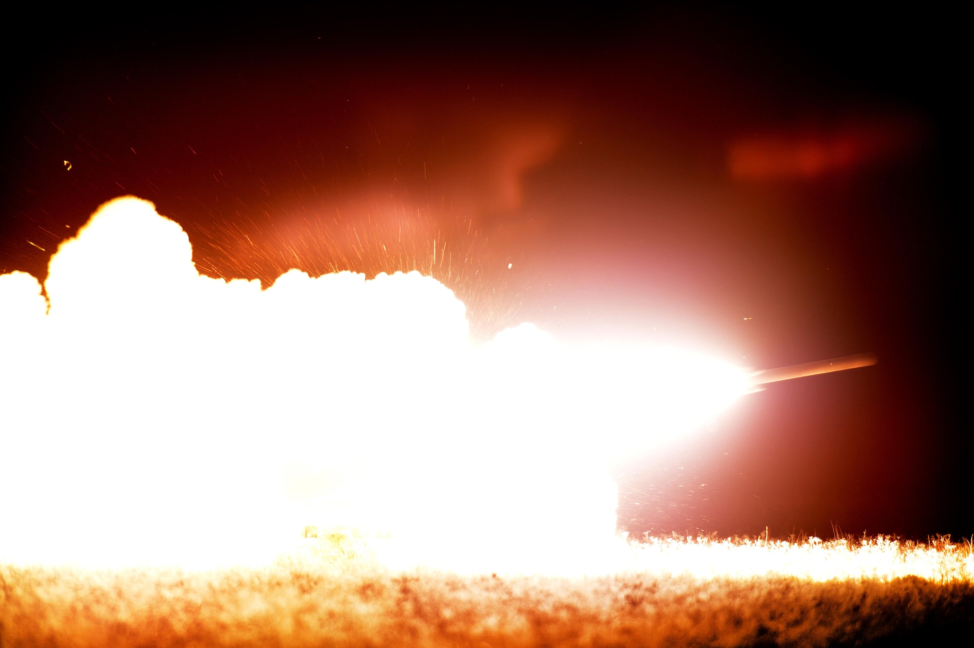 A High Mobility Artillery Rocket System crew fires a reduced range practice rocket in support of Emerald Warrior April 29, 2015 at Melrose Air Force Range N.M.  Emerald Warrior is the Department of Defense's only irregular warfare exercise, allowing joint and combined partners to train together and prepare for real world contingency operations. (U.S. Air Force photo/Staff Sgt. Matthew Plew)

