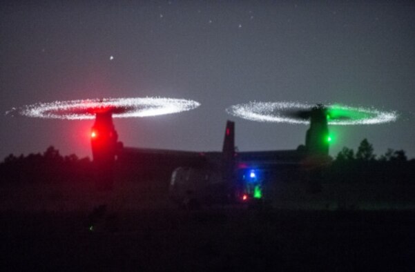 U.S. Air Force special tactics Airmen with the 21st Special Tactics Squadron conduct fast-rope training out of a CV-22 Osprey during Emerald Warrior near Hurlburt Field, Fla., April 21, 2015. Emerald Warrior is the Department of Defense's only irregular warfare exercise, allowing joint and combined partners to train together and prepare for real-world contingency operations. (U.S. Air Force photo by Staff Sgt. Matthew Bruch/Released)