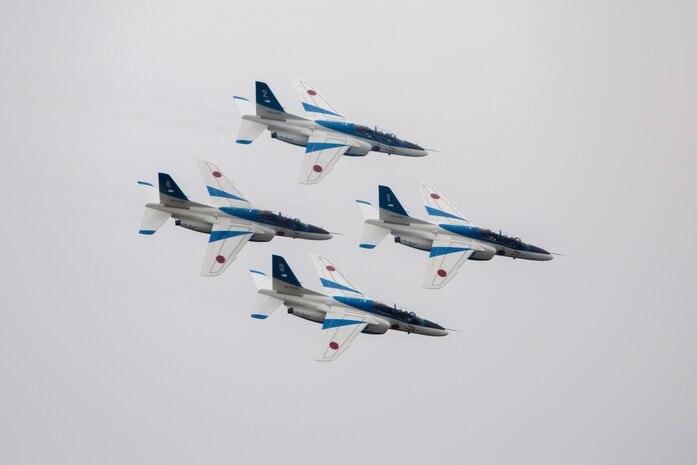 The Blue Impulse perform for visitors during the Japan Maritime Self-Defense Force/Marine Corps Air Station Iwakuni Friendship Day 2015 Air Show, May 3, 2015, aboard MCAS Iwakuni, Japan. The Blue Impulse are the Japan Air Self-Defense Force’s aerobatic display team which consists of seven Kawasaki T-4 training aircraft, only six of which perform during a show. Friendship Day presented visitors, near and far, the opportunity to come aboard the air station and interact with Japanese and American service members.