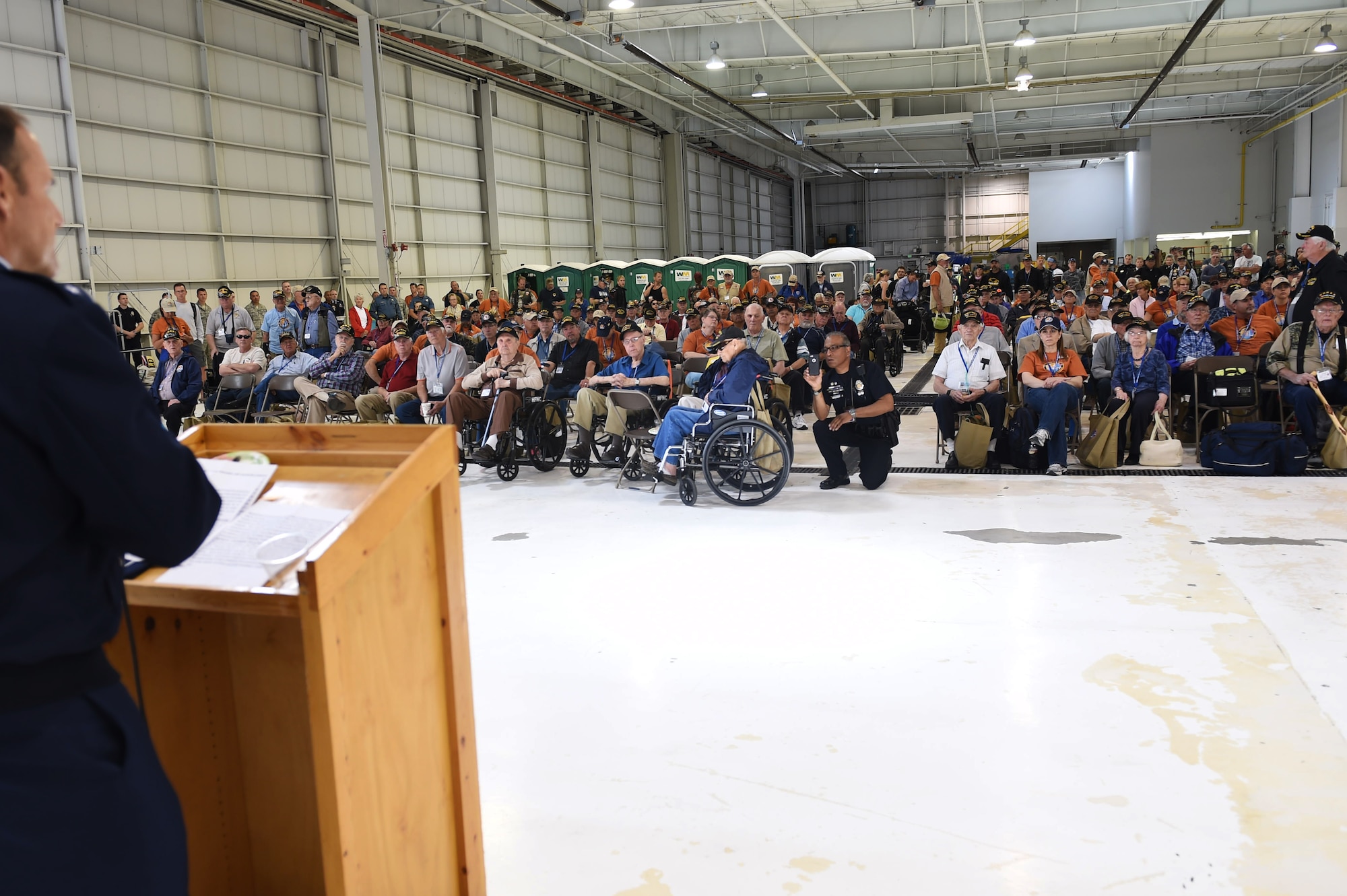 Maj. Gen. Trulan Eyre, 1st Air Force Air National Guard assistant to the commander, speaks to more than 75 World War II, Vietnam, Korea, terminally ill and Purple Heart recipient veterans before they board a plane May 3, 2015, at Denver International Airport in Denver. Hosted by the Honor Flight of Northern Colorado, the overnight trip to Washington D.C. gave veterans the chance to visit military memorials. The trip is offered every year free of charge for the vets through donations from the public. (U.S. Air Force photo Airman 1st Class Samantha Meadors/Released)