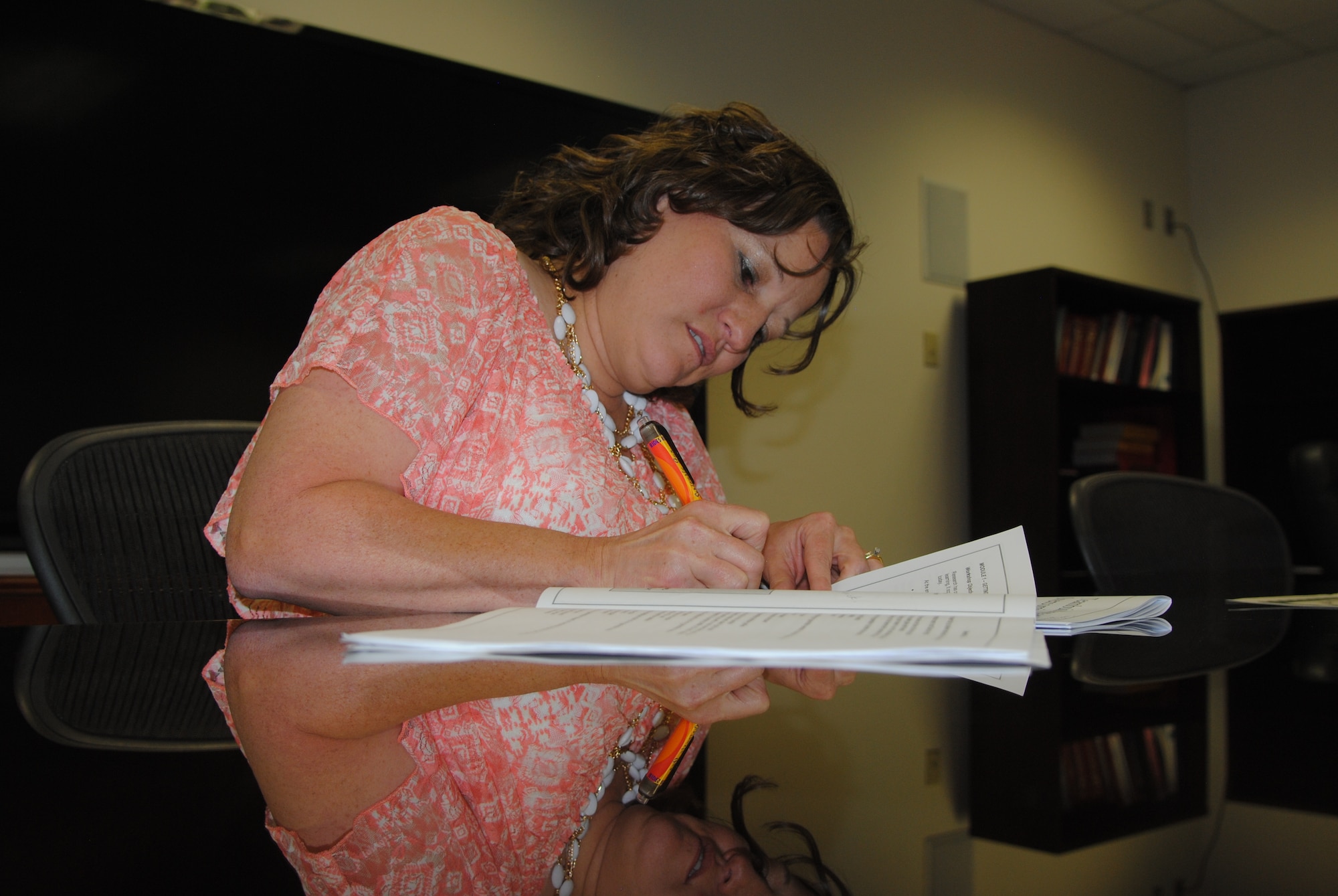 Kalee Dickey, 377th Dental Squadron, studies material for her final Leadership Pathways course. Dickey was the first member of Team Kirtland to earn LP certificates. (Photo by Jim Fisher)
