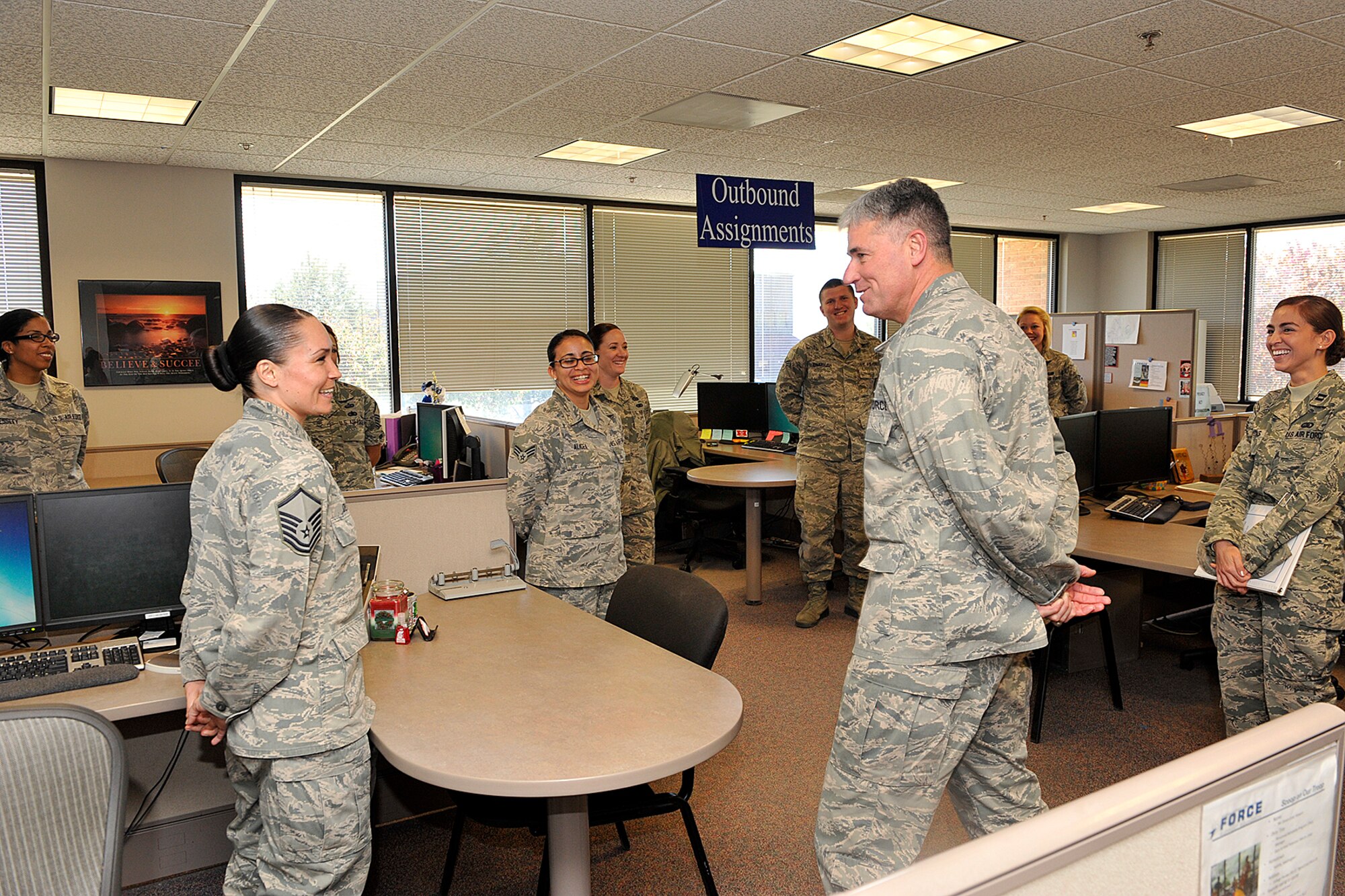 PETERSON AIR FORCE BASE, Colo. – Master Sgt. Elisha Olivas-Stewart, 302nd Force Support Squadron, and Lt. Gen. Samuel Cox, deputy Chief of Staff for Manpower, Personnel and Services, Headquarters U.S. Air Force, discuss issues regarding Total Force Integration during his visit here April 29. During his visit, Cox toured the Peterson education center, and received briefings on the 21st Space Wing and 302nd Airlift Wing combined customer support, career development and force management functions. Cox is the senior Air Force officer responsible for comprehensive plans and policies covering all life cycles of military and civilian personnel management, including military and civilian end strength management, education and training, compensation, resource allocation, and the worldwide U.S. Air Force services program. (U.S. Air Force photo by Philip Carter)