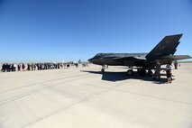 Laughlin Air Force Base student pilot graduates, Class 15-08, and their families tour two F-35 Lightning II jets on May 1, 2015. Luke currently has 22 of the scheduled 144 F-35’s on the flightline with 20 U.S. jets and two from the Royal Australian Air Force. A total of 11 countries will send representatives to Luke Air Force Base’s F-35 program, and in June, Luke will stand up the 62nd Fighter Squadron to begin flying in September. (U.S. Air Force photo by Tech. Sgt. Steven R. Doty)