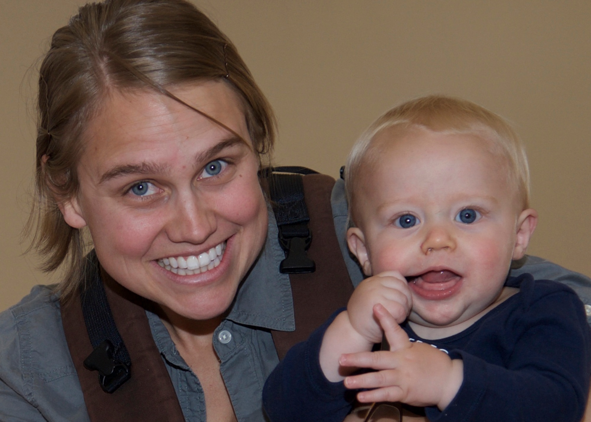 PETERSON AIR FORCE BASE, Colo. -- Sarah Lynch and her son Issac, pose for a photo during this year’s clothing drive at the R. P Lee Youth Center on Peterson AFB May 2. The Peterson Schriever Cheyenne Mountain Spouses’ Club and a team of volunteers spent the month of April collecting and sorting gently used children’s clothes and other donations for the event, which were then distributed free to those attending the event. (U.S. Air Force photo by Staff Sgt. J. Aaron Breeden)