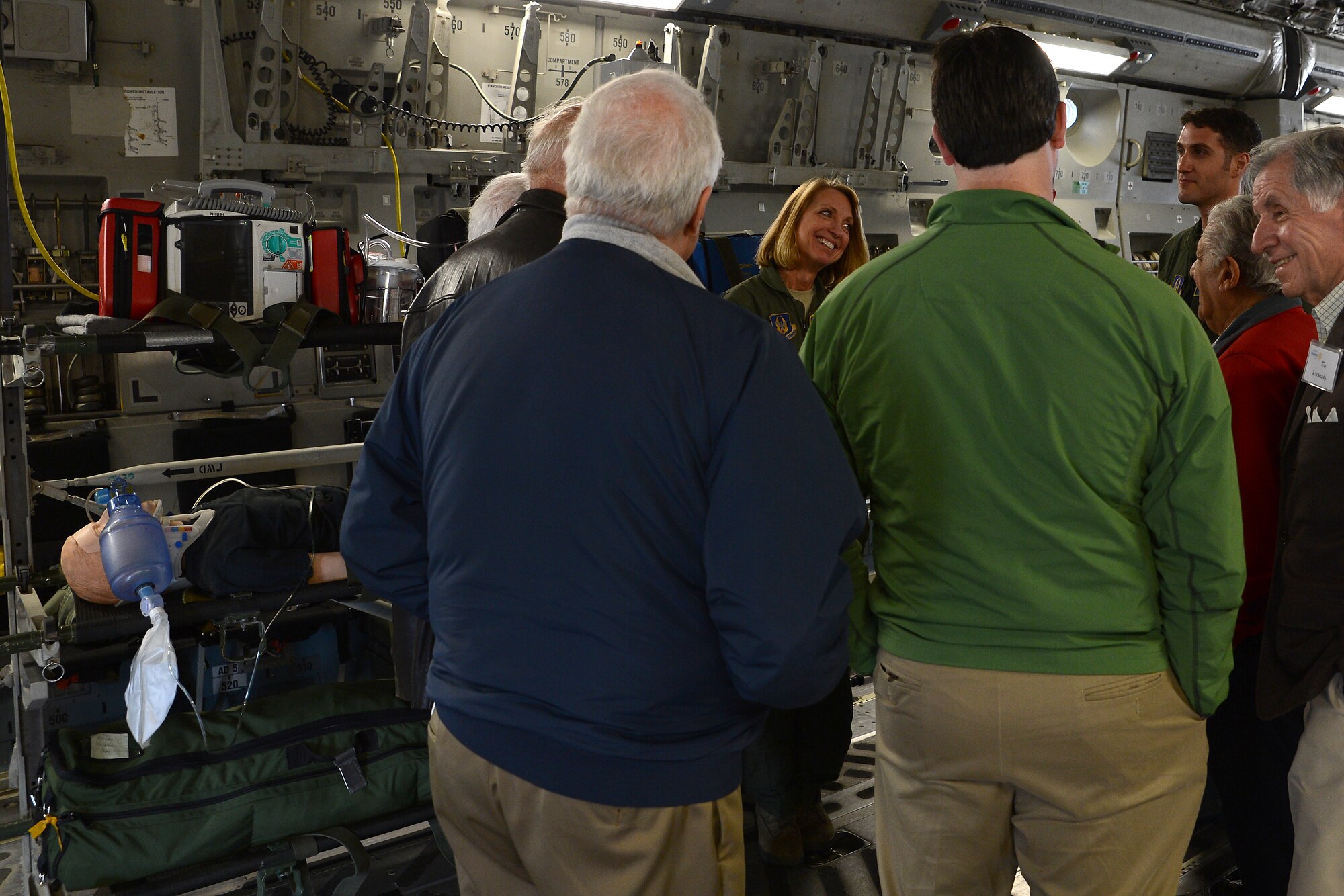 Lt. Col. Michelle Tirado, 446th Airlift Wing chief flight nurse, briefs members of the Seattle 4 Rotary Club April 30, 2015, at Joint Base Lewis-McChord, Wash., on the aeromedical evacuation mission performed by the 446th AW. Aeromedical evacuation is one of the primary missions performed by the 446th AW. (U.S. Air Force photo\Staff Sgt. Tim Chacon)