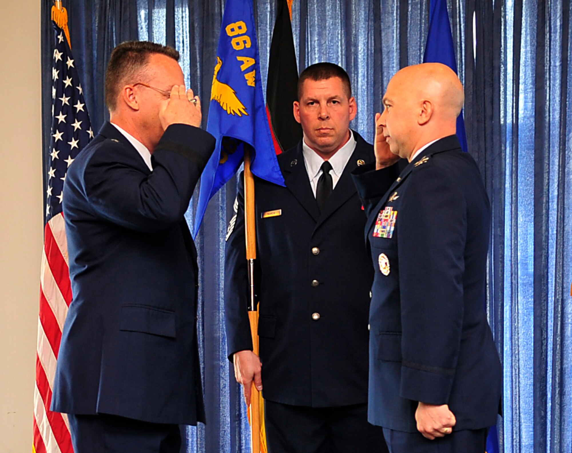 Col. Curtis Juell, 86th Mission Support Group commander, salutes Brig. Gen. Patrick Mordente, 86th Airlift Wing commander, during an assumption of command ceremony April 29, 2015, at Ramstein Air Base, Germany. Juell assumed command of the 86th MSG, which supports the overall Air Force mission by providing security, communications and services to support more than 54,000 military members, retirees and their family members in the KMC area. (U.S. Air Force photo/Airman 1st Class Larissa Greatwood)