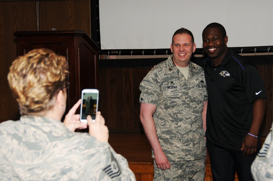 Justin Forsett, Baltimore Ravens running back, poses with liberators at the 459th Air Refueling Wing’s first prayer breakfast in the 459 wing auditorium at Joint Base Andrews, Md., May 2, 2015.  Forsett shared his life story about his faith in God in times of uncertainty throughout his football career. (U.S. Air Force photo/ Tech. Sgt. Brent Skeen)