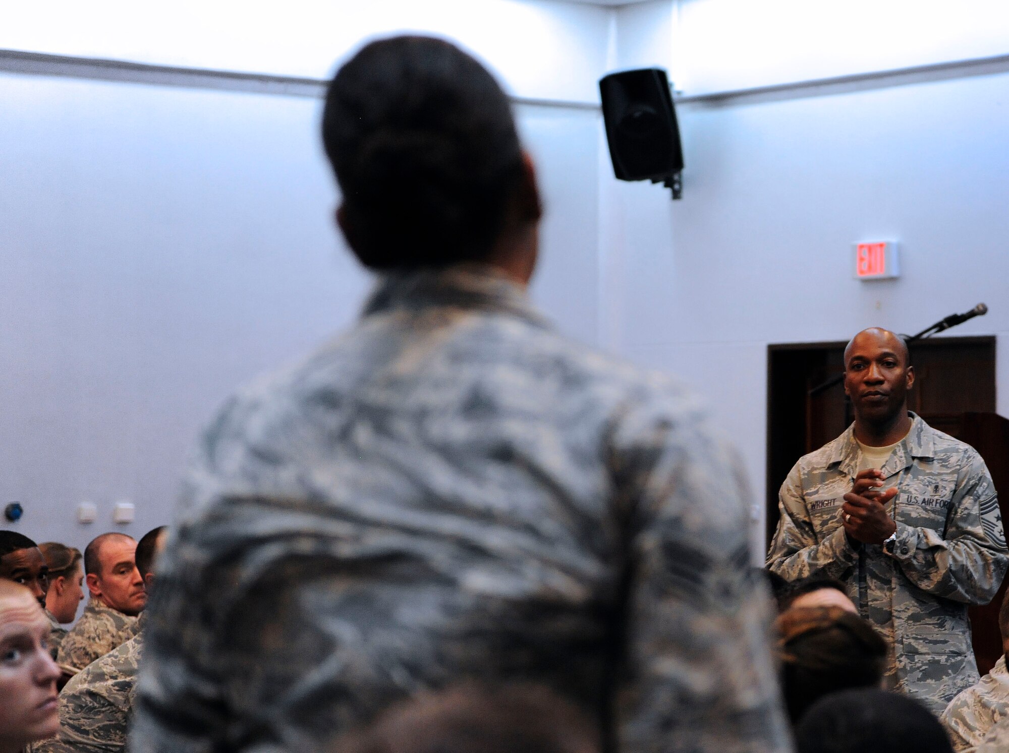 Chief Master Sgt. Kaleth Wright, 3rd Air Force and 17th Expeditionary Air Force command chief, answers questions from Airmen during an all call April 28, 2015 at Incirlik Air Base, Turkey. Wright spoke to Airmen about issues concerning the mission as well as changes in the Air Force. (U.S. Air Force photo by Senior Airman Krystal Ardrey/Released)