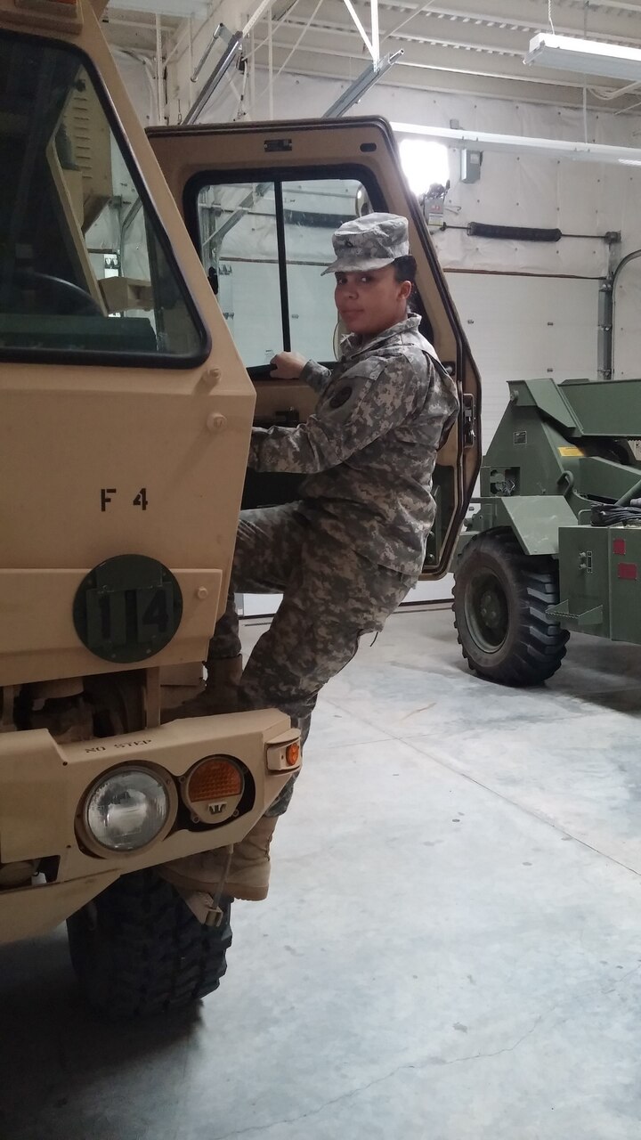 Oregon Army National Guard Pfc. Chelsea Fudge steps up into the cab of a light mobile tactical vehicle at the Baker City, Ore., armory during a weekend drill, March 14, 2015. Assigned to Foxtrot Company, 145th Brigade Support Battalion, 116th Cavalry Brigade Combat Team, Fudge said her experience in the military has proven to be beneficial both personally and professionally. Oregon Army National Guard photo by Staff Sgt. Patrick Caldwell