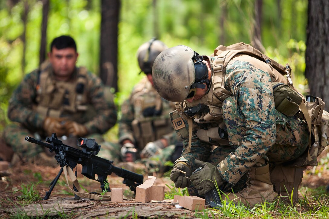 A Chilean special forces soldier loads ammunition at a rifle range during a bilateral training exchange on Camp Shelby, Miss., April 23, 2015.