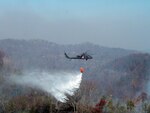 UH-60 Blackhawks from the Kentucky National Guard similar to the ones photographed here responded to fires on the Fort Knox training ranges, Oct. 23-24, 2010.