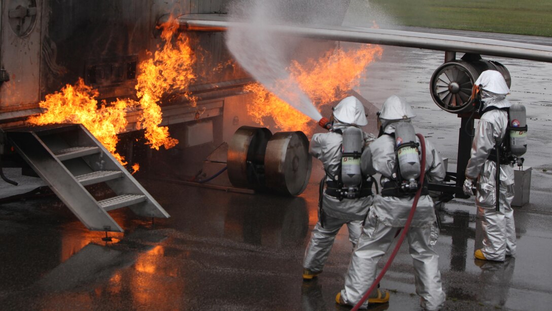 Marines with Aircraft Rescue and Firefighting partnered with members of the Wilmington Fire Department during training at Marine Corps Air Station Cherry Point, North Carolina, April 30. Numerous firefighting exercises were conducted during the training session in order to prepare the firefighters for real-life scenarios they may face.
