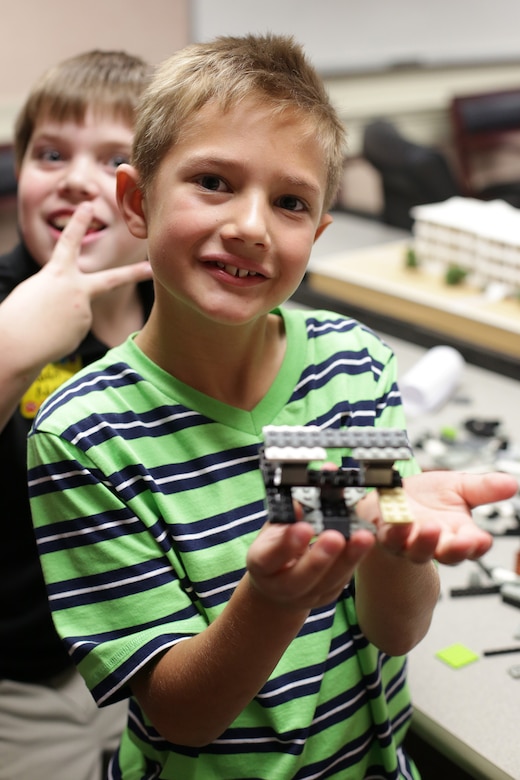 During the district’s Take our Daughters and Sons to Work Day held May 1, students use Legos to construct buildings as part of a structural engineering lesson. Participants discovered the district’s expansive footprint on public works projects throughout the Southeast and also tapped into large-scale efforts such as the Savannah Harbor Expansion Project, dam operations, wetlands restoration projects and other salient initiatives during the four-hour event.