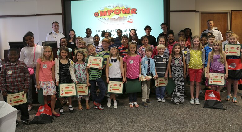 Dependents of district employees receive certificates and gather for the Take our Daughters and Sons to Work Day held May 1. Facilitators guided participants through age-appropriate breakout sessions as students discovered the district’s expansive footprint on public works projects throughout the Southeast. Participants also tapped into large-scale efforts such as the Savannah Harbor Expansion Project, dam operations, wetlands restoration projects and other salient initiatives during the four-hour event.