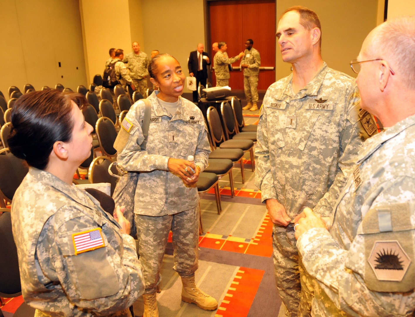 Chief Warrant Officer 5 Gary R. Nisker, the Army National Guard's command chief warrant officer speaks to fellow chief warrant officers after their breakout session at the 2010 Association of the U.S. Army annual meeting in Washington D.C., Oct. 26, 2010. 