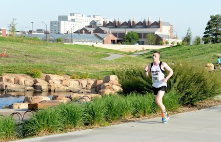 First Lieutenant Kenneth Rayner, a platoon leader with the Massachusetts Army National Guard, runs in the 38th annual Lincoln National Guard Marathon in Lincoln, Neb., May 3, 2015. Rayner led the way for all National Guard runners and finished second place overall with his time of 2 hours, 37 minutes and 9 seconds.