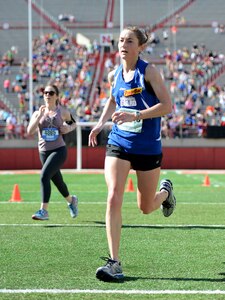 Staff Sgt. Emily Shertzer, an oboist with the Pennsylvania Air National Guard’s 553rd Band of the Mid-Atlantic, completes the final steps of the 38th annual Lincoln National Guard Marathon in Lincoln, Nebrasa, May 3. Shertzer, who was the top female finisher in last year's marathon, once again led the way for all National Guard females and finished third place overall with her time of 2 hours, 55 minutes and 16 seconds.