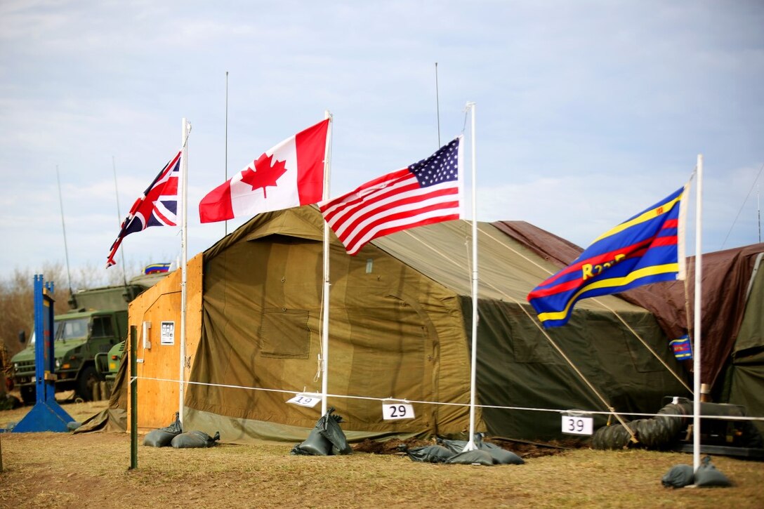 The view outside of the exercise command post prior to the launch of Exercise Maple Resolve 15 at the Canadian Manoeuvre Training Center, Camp Wainwright, Alberta, April 30, 2015. The multi-national exercise, conducted annually by the Canadian Army, is a three-week high-readiness validation exercise for Canadian Army elements designated for domestic or international operations. This year, the 1st Canadian Army Division and the 5th Canadian Mechanized Battle Group (5 CMBBG) are being supported by the British 12th Armoured Infantry Brigade, various U.S. Army elements, and for the first time, members of  I MEF’s 1st ANGLICO who bring a unique capability to the table. (U.S. Marine Corps photo by Cpl. Owen Kimbrel)