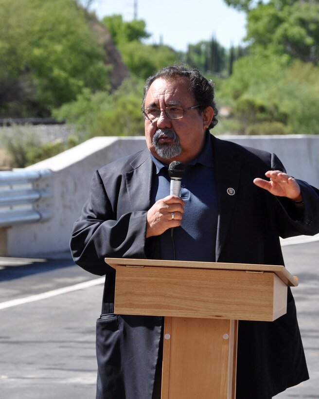 Rep. Raúl M. Grijalva addresses Chula Vista neighborhood residents April 17 during a ribbon cutting ceremony officially opening the bridge spanning the Nogales Wash in Nogales, Arizona. The U.S. Army Corps of Engineers Los Angeles District constructed the $4 million bridge after the original structure was removed in 2008 as part of a flood control construction project.