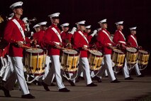 The U.S. Marine Drum & Bugle Corps performs during an evening parade at Marine Barracks Washington, D.C., May 1, 2015. The parades, which are held Friday nights during the summer months, are a means of honoring senior officials, distinguished citizens, and supporters of the U.S. Marine Corps. (U.S. Marine Corps photo by Lance Cpl. Alejandro Sierras/ Released) 