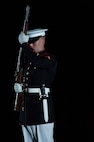A Marine with the Silent Drill Platoon, performs during an evening parade at Marine Barracks Washington, D.C., May  1, 2015. The parades, which are held Friday nights during the summer months, are a means of honoring senior officials, distinguished citizens, and supporters of the Marine Corps. (U.S. Marine Corps photo by Lance Cpl. Kayla V. McTaw/Released)