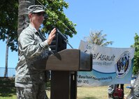 Col. Randall Huiss, 15th Wing Commander, speaks to Airmen at the Sexual Assault Awareness and Prevention Month beach bash on Joint Base Pearl Harbor-Hickam, Hawaii, April 30, 2015.The 2015 SAAPM campaign was packed full of events and activities that focused on educating the Hickam community on sexual assault awareness and prevention. (U.S. Air Force photo by 2nd Lt. Kaitlin Daddona/Released)