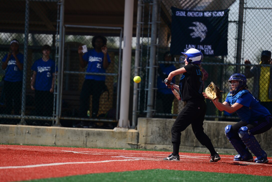 Avery Lokowich, daughter of Lt.Col. Luke Lokowich, 5th Reconnaissance Squadron commander and a U-2 pilot, takes a swing during her softball game April 25, 2015, at Osan Air Base, Republic of Korea. Avery is a freshman who plays for the Osan American High School Cougars softball team. (U.S. Air Force photo by Senior Airman Matthew Lancaster)