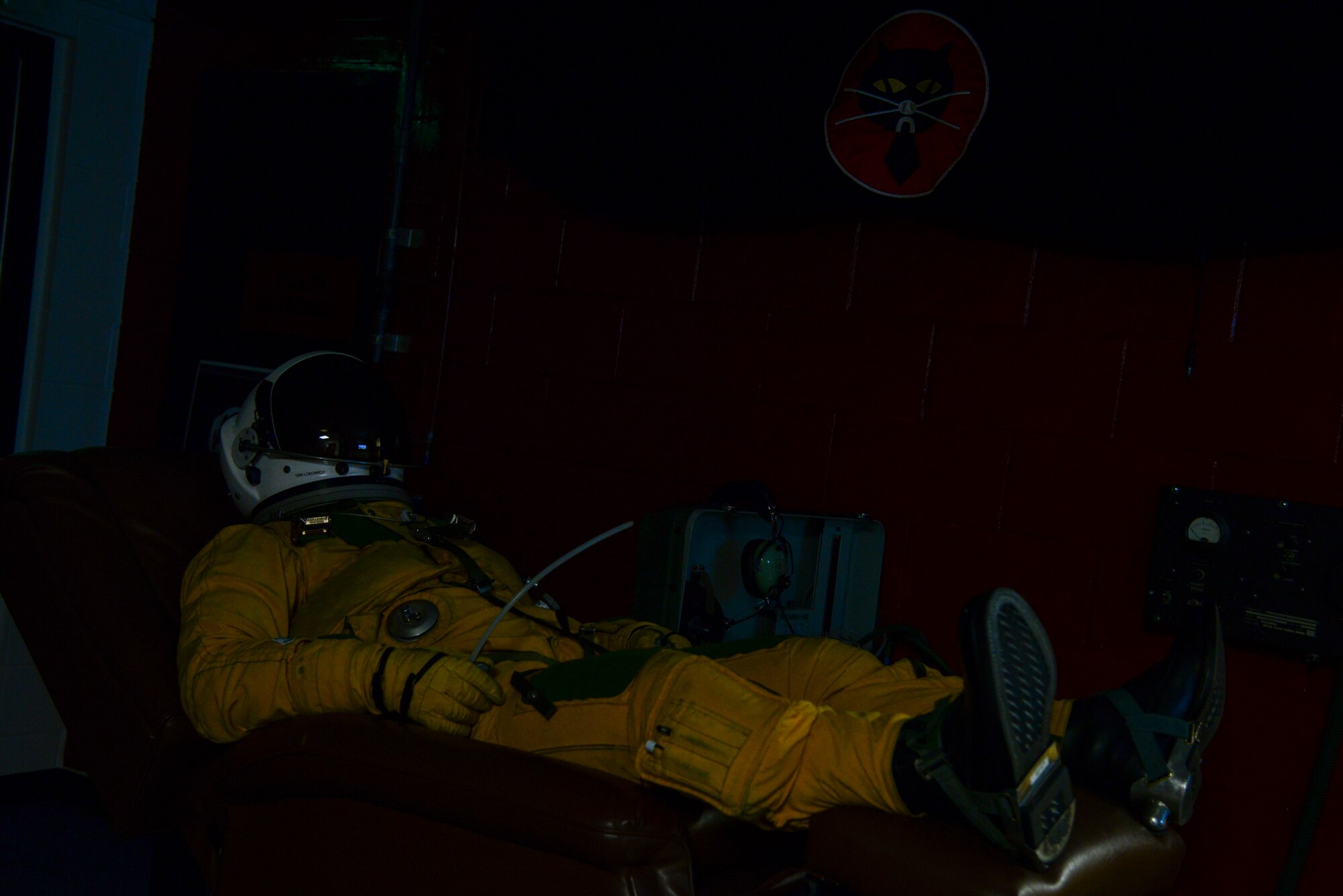 Lt. Col. Luke Lokowich, 5th Reconnaissance Squadron commander and a U-2 pilot, breathes in pure oxygen before his high-altitude flight April 22, 2015, at Osan Air Base, Republic of Korea. In preparation for a high-altitude flight U-2 pilots must intake pure oxygen for one hour before they take off for their flight. (U.S. Air Force photo by Senior Airman Matthew Lancaster)