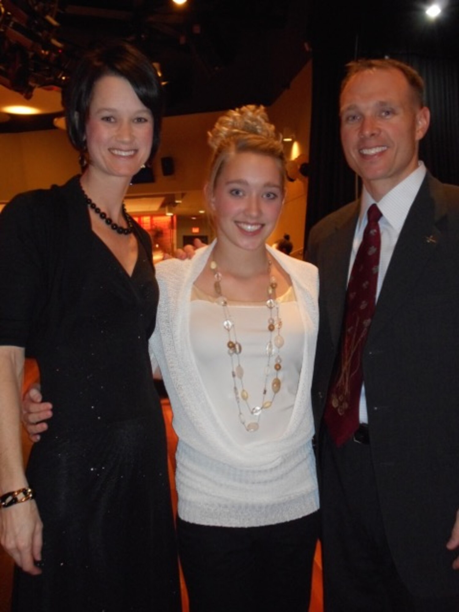 Lt. Col. Luke Lokowich, 5th Reconnaissance Squadron commander, his wife Lindsey and his daughter Avery, attend a function at Osan Air Base, Republic of Korea in January 2015. (Courtesy photo)