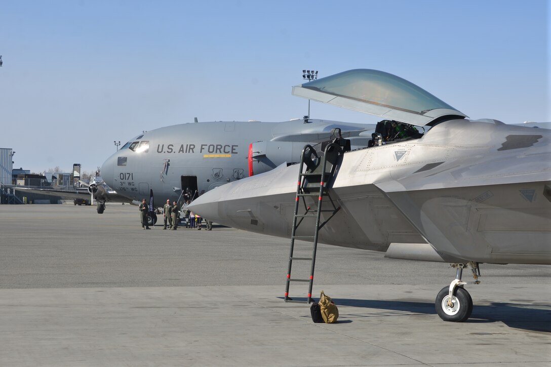 An F-22 Raptor and a C-17 Globemaster from Joint Base Elmendorf-Richardson join more than 200 other aircraft as part of this year's Great Alaska Aviation Gathering May 2-3 at the Ted Stevens International Airport. The show, sponsored by the Alaska Airman Association, attracts more than 23,000 pilots and aviation enthusiasts from around the world. (Air Force Photo/Tech. Sgt. Dana Rosso)