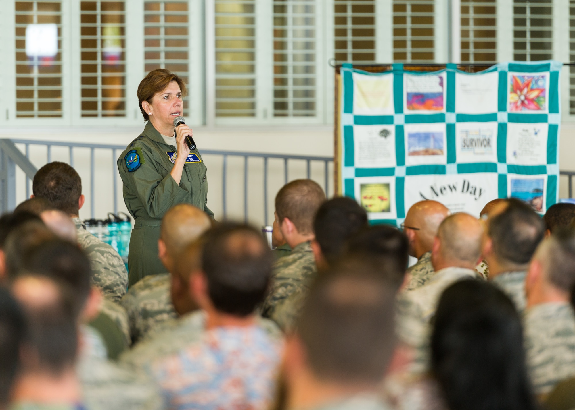 U.S. Air Force Gen. Lori J. Robinson, Pacific Air Forces commander, gives her opening comments prior to PACAF's Sexual Assault Prevention and Response training day, Joint Base Pearl Harbor-Hickam, Apr. 28, 2015.  The training is an annual training requirement for all Airmen and addressed a number of topics ranging from defining sexual harrassment to  eliminating sexual assault in the Air Force through professional, respectful behavior.     (U.S. Air Force photo by Tech. Sgt. James Stewart/Released)(U.S. Air Force photo by Tech. Sgt. James Stewart/Released)