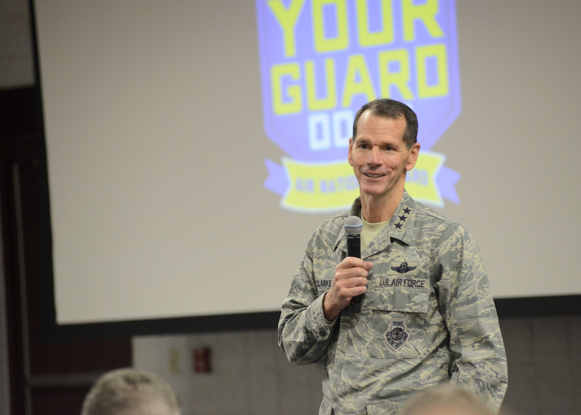 Director of the Air National Guard Lt. Gen. Stanley E. Clarke III discusses issues currently faced across the ANG during the 2015 Executive Safety Summit held at Volk Field Combat Readiness Center, Wisconsin, May 5, 2015. The conference covers a wide range of topics for senior leaders including safety, resilience, risk management and mishap prevention. (US Air National Guard photo by Staff Sgt. John E. Hillier/RELEASED)