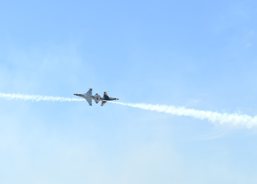 The U.S. Air Force Thunderbirds perform for an airshow, May 3, 2015, at Dyess Air Force Base, Texas. During the 2015 Dyess Big Country Airfest, visitors watched more than 10 aerial acts and viewed more than 40 different static displays. (U.S. Air Force photo by Airman 1st Class Alexander Guerrero/Released)