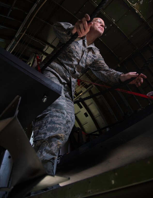 Chief Master Sgt. Todd Cole, 89th Airlift Wing command chief, walks through the bomb bay of the B-17G Texas Raiders at Joint Base Andrews, Md., May 4, 2015. (U.S. Air Force photo/Airman 1st Class Philip Bryant)