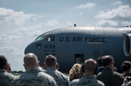A C-17 Globemaster III lands May 5, 2015 at Joint Base Charleston, S.C, during an event celebrating the C-17 surpassing the three millionth flying hour.  Aircrew members from JB Charleston flew the plane here from Robins Air Force Base, Ga. The first C-17 flight was Sept. 15, 1991 and the Air Force currently has 222 C-17’s in the fleet. (U.S. Air Force photo/Senior Airman Jared Trimarchi) 
