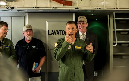 Col. John Lamontagne, 437th Airlift Wing commander, addresses a crowd aboard a C-17 Globemaster III May 5, 2015 at Joint Base Charleston, S.C., during an event celebrating the C-17 surpassing the three millionth flying hour.  An aircrew from JB Charleston flew the plane here from Robins Air Force Base, Ga. The first C-17 flight was Sept. 15, 1991 and the Air Force currently has 222 C-17’s in the fleet. (U.S. Air Force photo/Senior Airman Jared Trimarchi) 