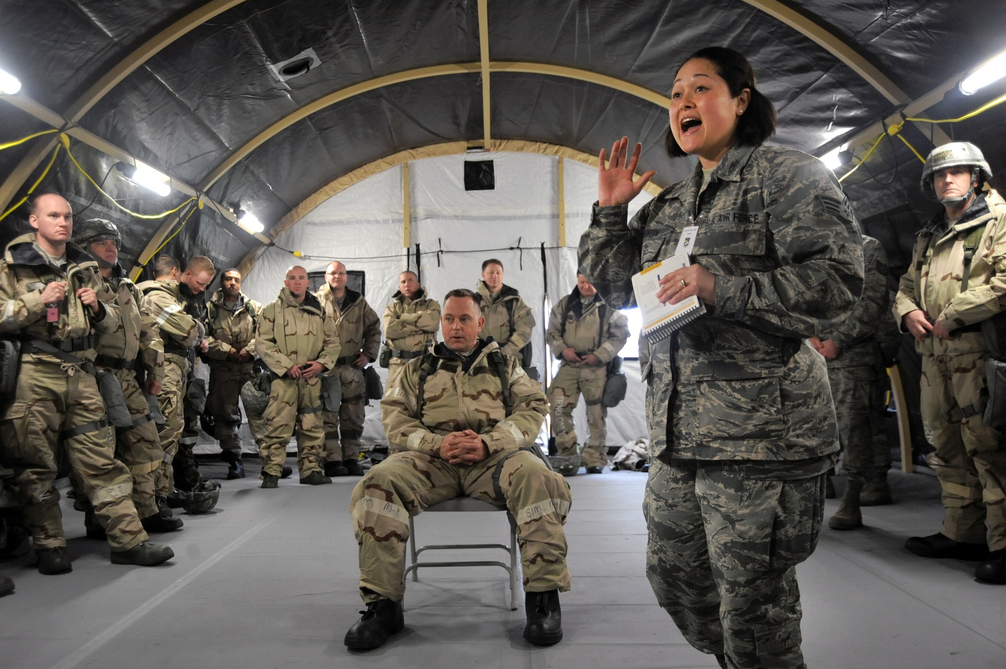 Oregon Senior Airman Crystal Atkinson, assigned to the 142nd Civil Engineer Squadron, instructs Airmen during the AEF Skills Rodeo, April 12, 2015, Portland Air National Guard Base, Ore. (U.S. Air National Guard photo by Tech. Sgt. John Hughel, 142nd Fighter Wing Public Affairs/Release)
